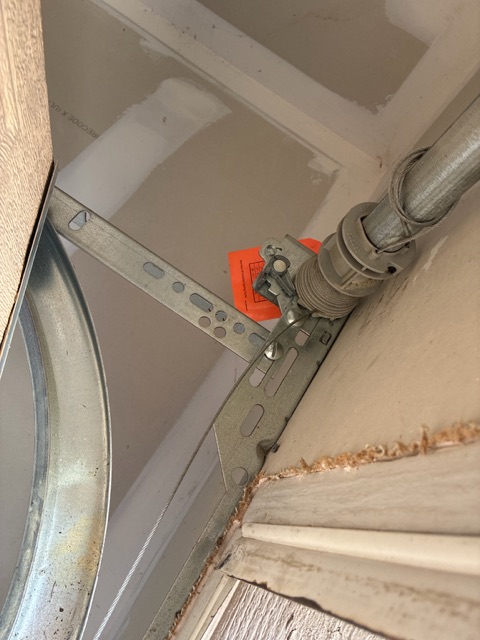 Garage door spring bracket detail in New Braunfels TX